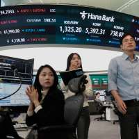Wall Street loses ground under pressure from rising oil prices