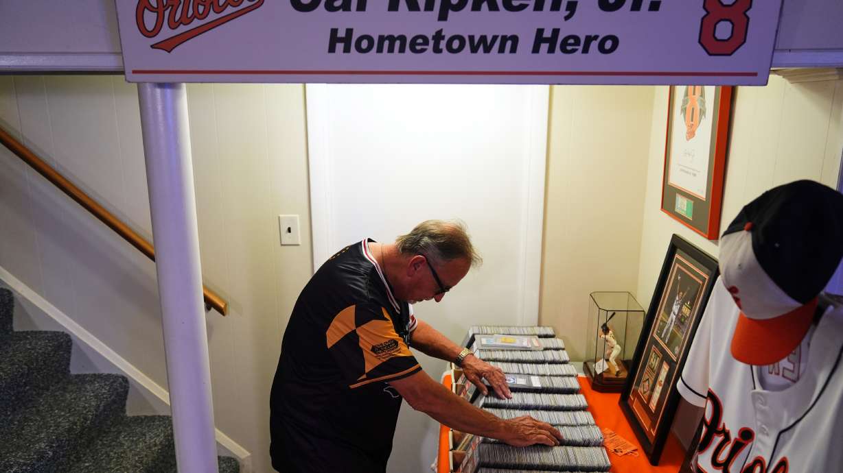 Baltimore Orioles fan Rick Taylor looks through his collection of tickets from almost every baseball game of Cal Ripken Jr.'s 2,632 game "Iron Man" streak, at his home in Reisterstown, Md., Tuesday, Oct. 13, 2026.