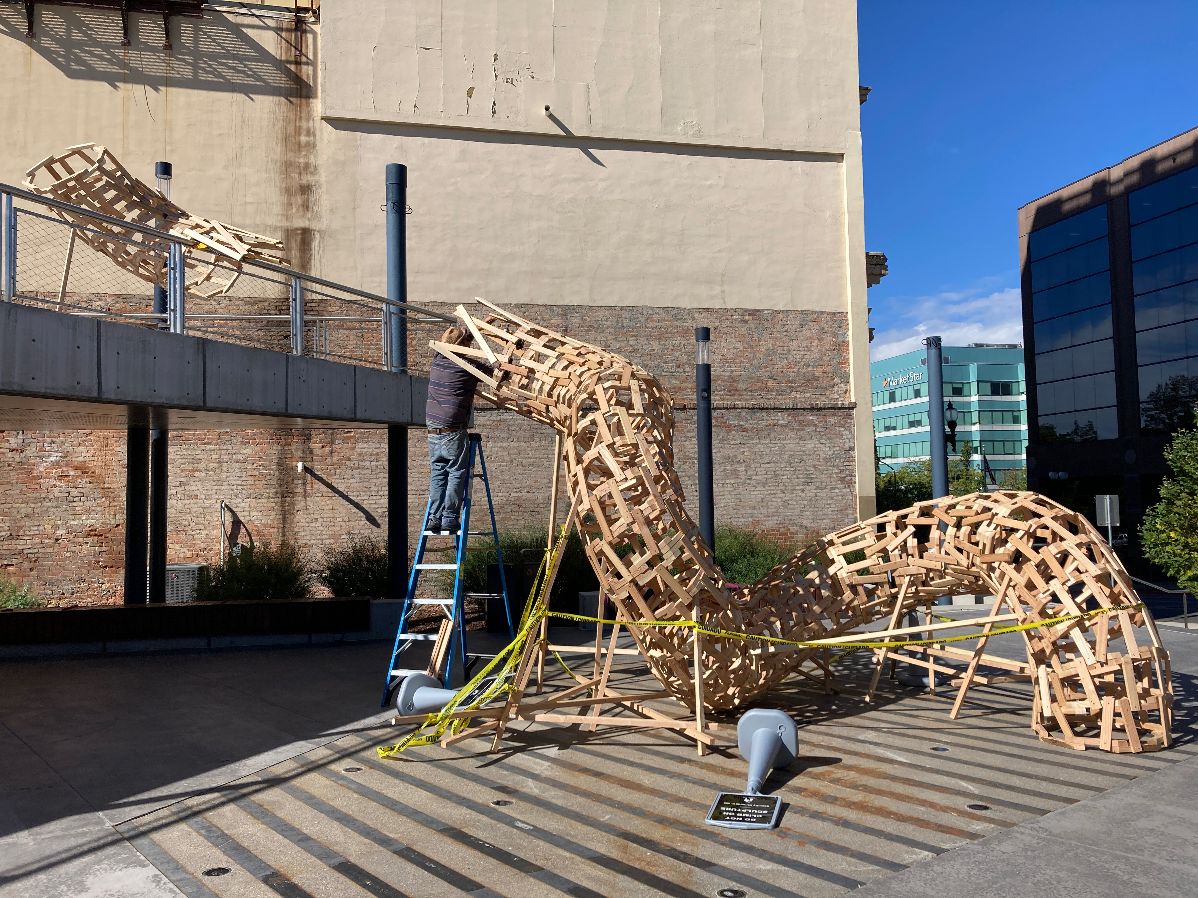 French artist Elparo works on a new art installation titled "La Vrille" at Dumke Arts Plaza, 445 25th Street in Ogden. The artwork will be open to the public from Oct. 29 until April 9.