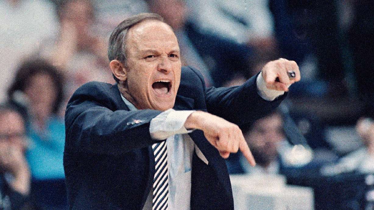 FILE - LSU's head basketball coach Dale Brown yells to his team from the sideline during a national semifinal at the Final Four of the NCAA men's college basketball tournament at Reunion Arena in Dallas, March 29, 1986. .