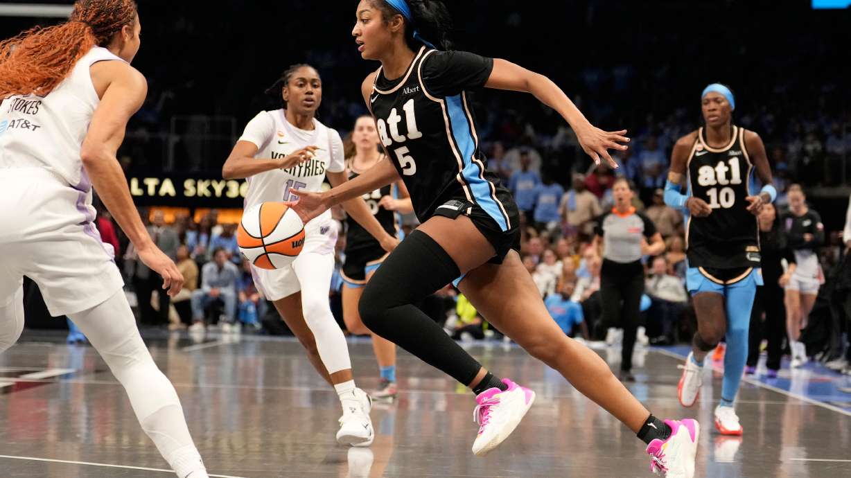 Atlanta Dream forward Angel Reese (5) dribbles during the second half of Game 3 of the WNBA basketball finals against the Golden State Valkyries on Wednesday, Oct. 21, 2026, in Atlanta.