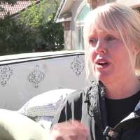 Hurricane woman escapes as onslaught of mud enters home