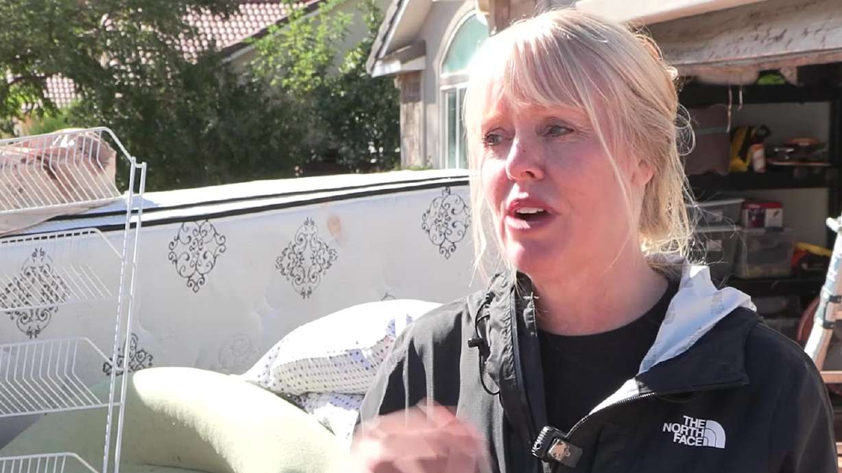 Elizabeth Lucas speaks with KSL on Friday. Lucas said she feared for her safety as an onslaught of mud and water rushed into her home on Thursday.