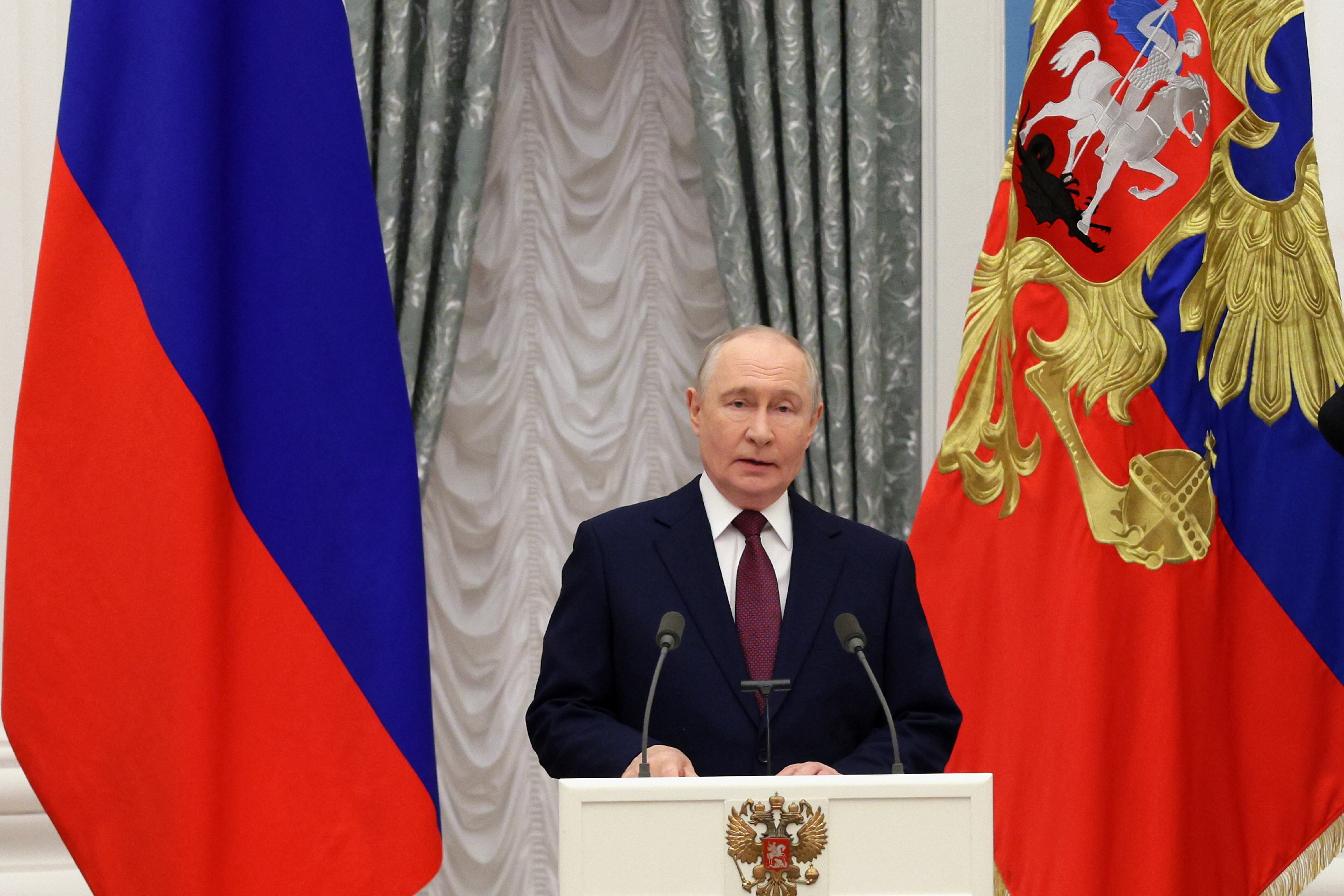 Russian President Vladimir Putin delivers his speech at the presentation of a banner of the Federal Customs Service at the Kremlin in Moscow, Thursday.