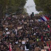 More than 400,000 protest across France, challenging Macron as Paris clashes erupt