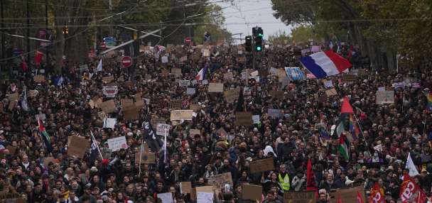 More than 400,000 protest across France, challenging Macron as Paris clashes erupt