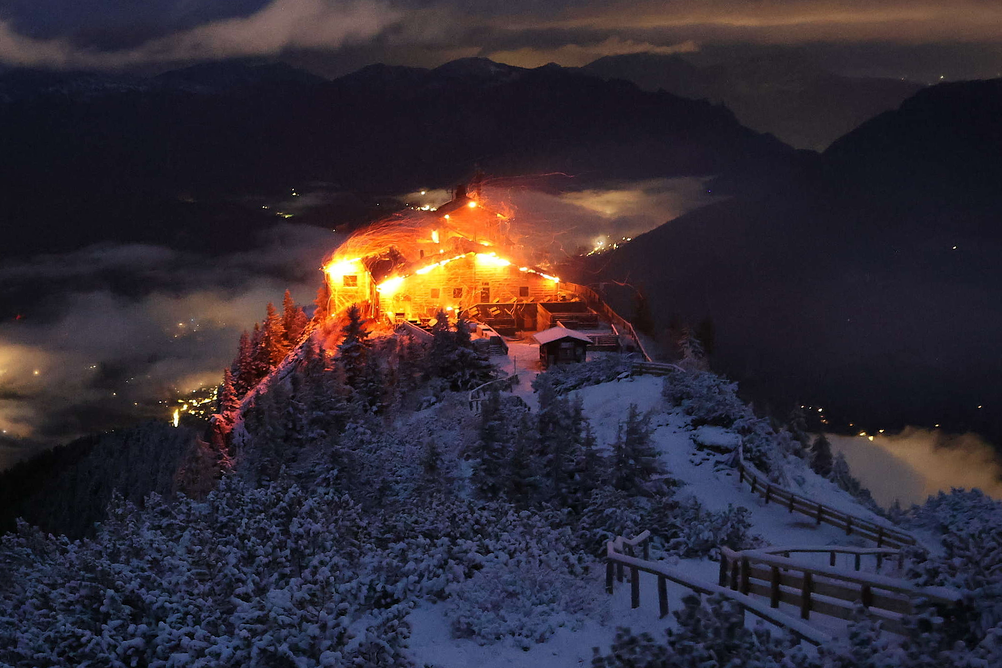 A fire devastates the Eagle's Nest retreat built for Hitler in Germany. A suspect is detained