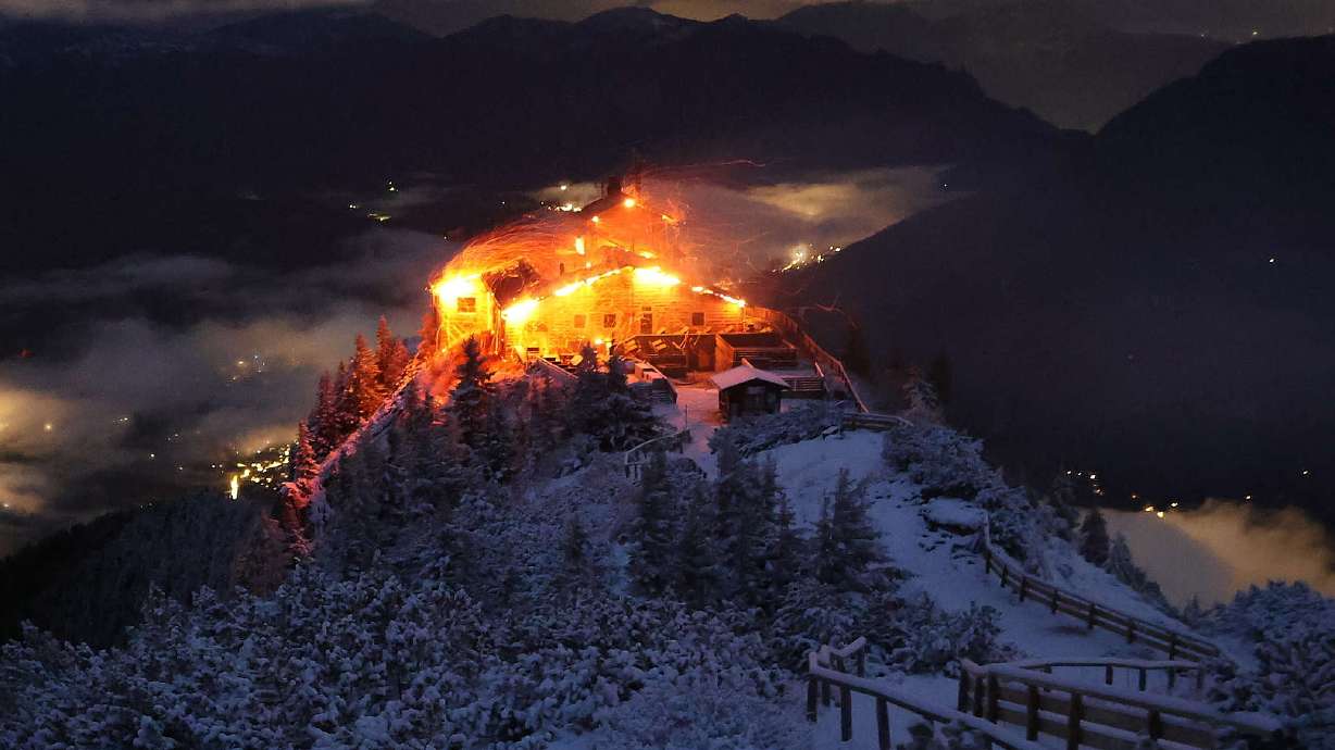 This image distributed by the 'Bergerlebnis Berchtesgaden' shows a building known as the Eagle's Nest built for Adolf Hitler in the Bavarian Alps on fire early Saturday.