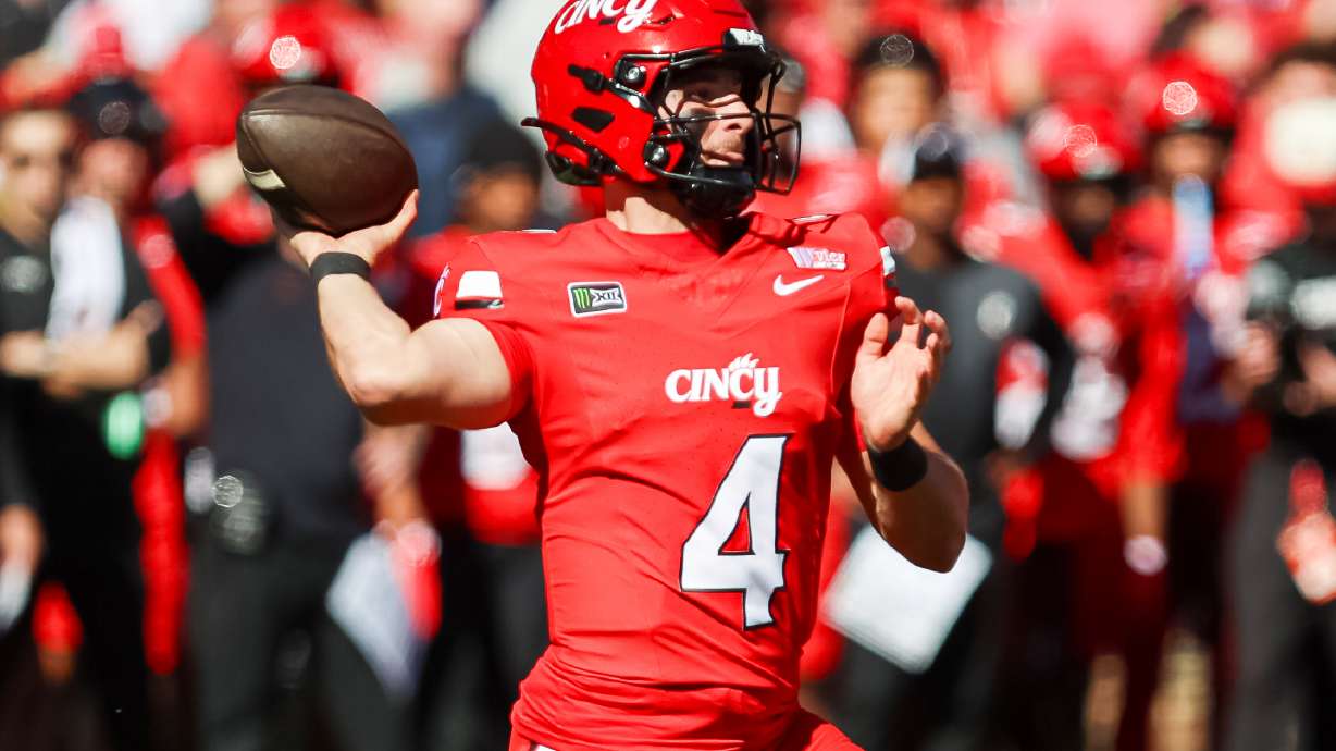 Cincinnati quarterback JC French IV (4) throws a pass during the first half of an NCAA college football game against Texas Tech, Saturday, Oct. 24 2026, in Cincinnati.