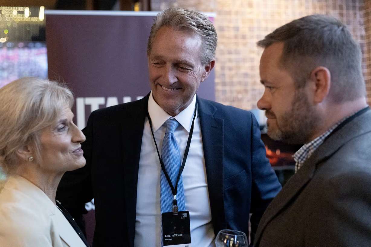 Former Amb. Jeff Flake and his wife Cheryl talk at a reception in Dublin for the Utah delegation during a trade mission to Ireland on Wednesday.