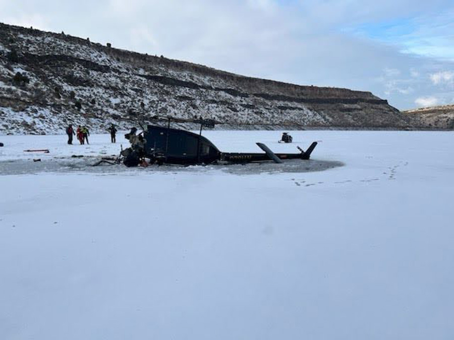 The aftermath of a helicopter crash on Ririe Reservoir in Idaho, Feb. 20, 2025. The National Transportation Safety Board released its final report on the crash Saturday.