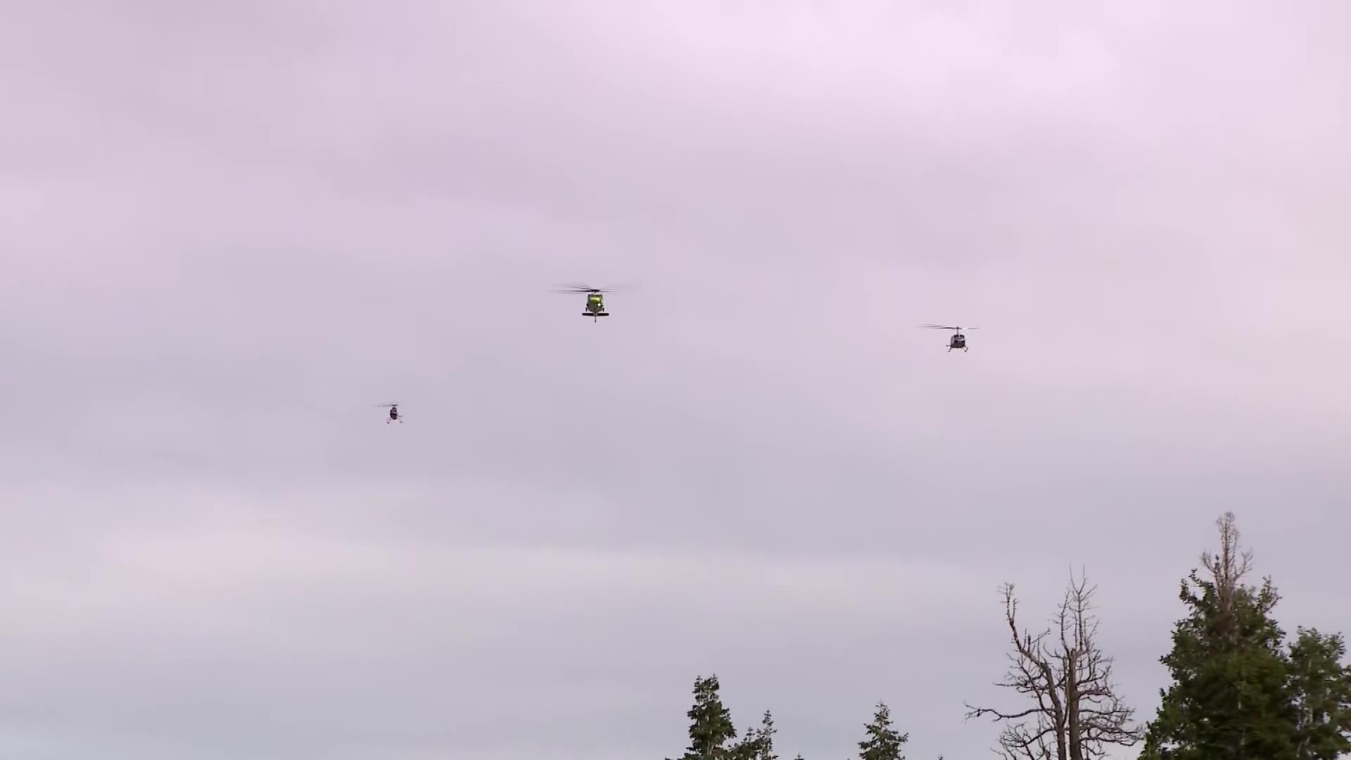 Helicopters fly over the celebration of life for Ryan Cutter, in Park City, Saturday. Cutter died in late September while fighting the Dome Fire in California.