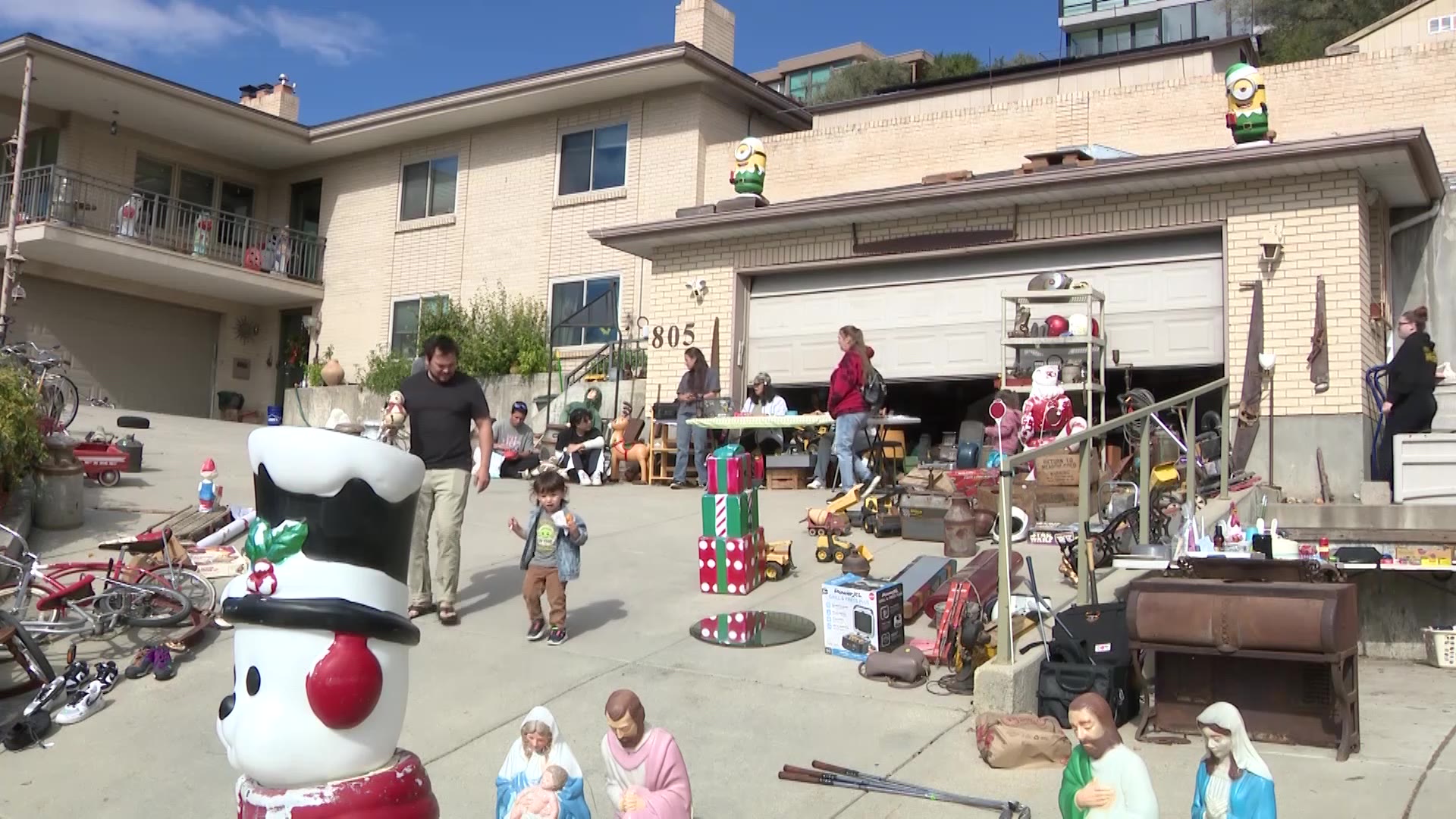 A yard sale of Christmas decorations held at Forrest Nunley's house in Salt Lake City, Saturday. Over 300 decorations were sold, with 100 more being kept for the Nunley family.