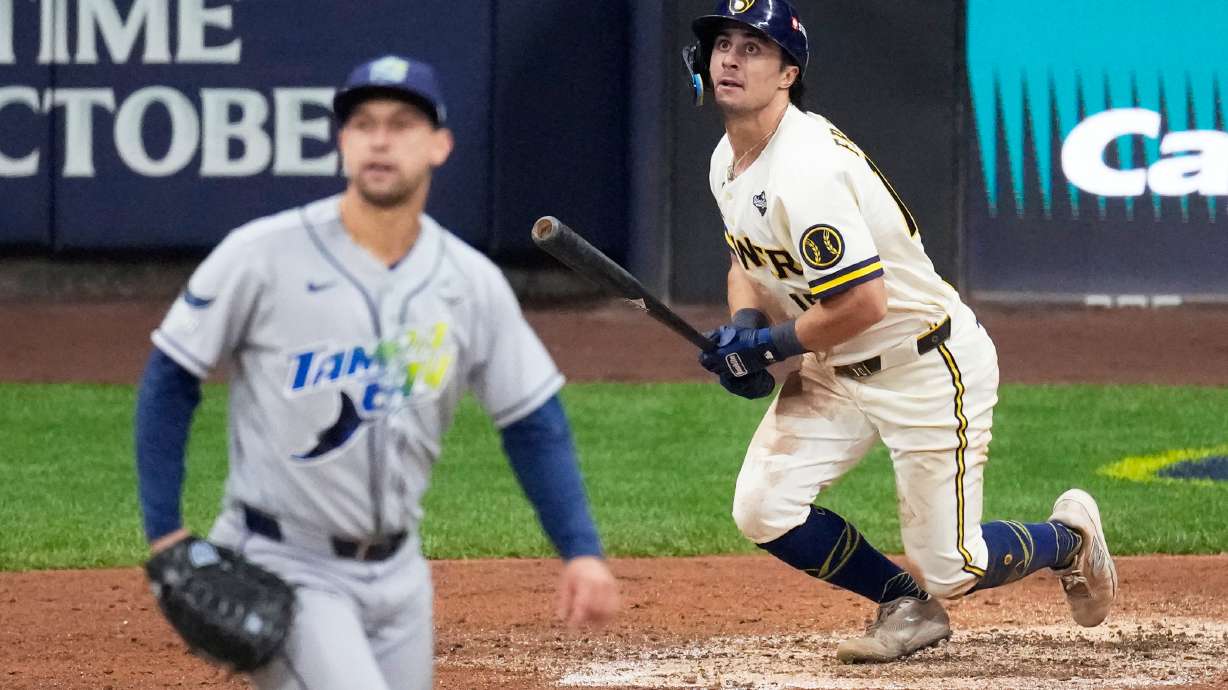 Milwaukee Brewers' Sal Frelick watches his home run during the sixth inning of Game 2 of baseball's World Series, Saturday, Oct. 24, 2026, in Milwaukee, between the Milwaukee Brewers and the Tampa Bay Rays.