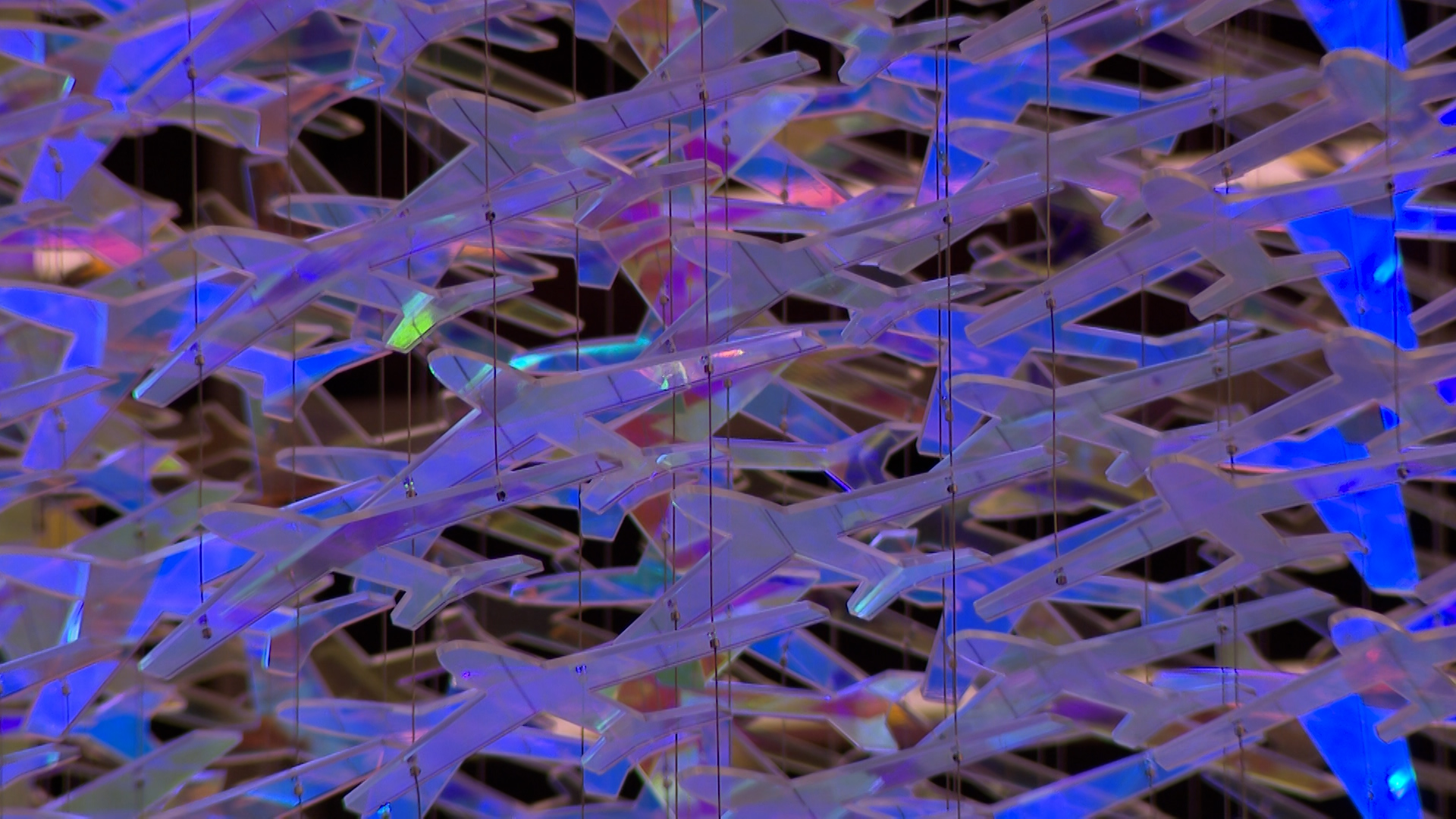 The art installation "Crossroads of the World," made up of laser-cut acrylic airplanes, is pictured on Saturday at Salt Lake City International Airport.