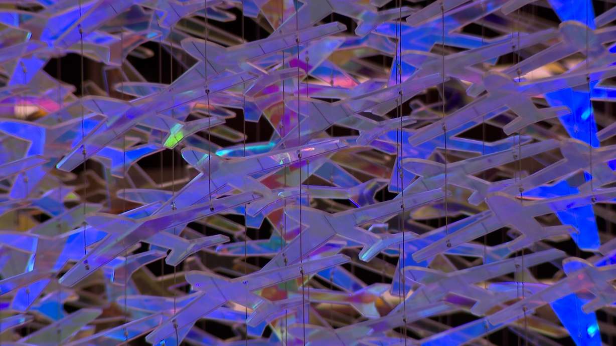 The art installation "Crossroads of the World," made up of laser-cut acrylic airplanes, is pictured on Saturday at Salt Lake City International Airport.