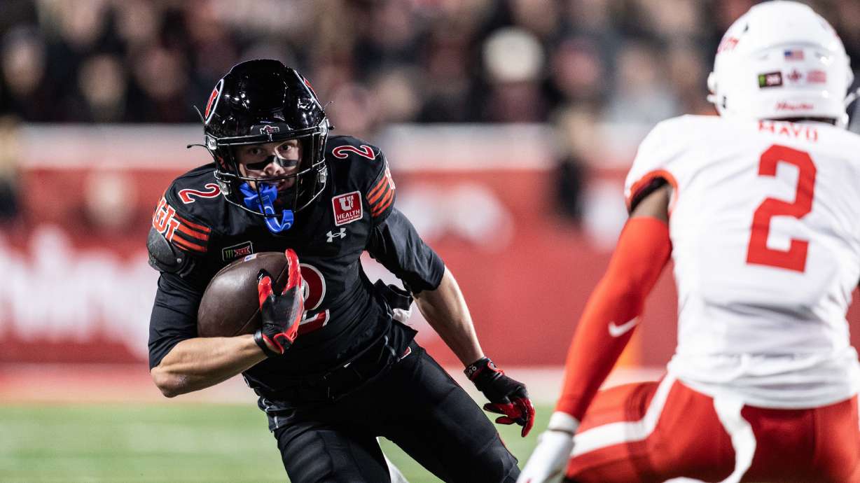 Utah Utes wide receiver Creed Whittemore (2) runs with the ball during a game against Houston at Rice-Eccles Stadium in Salt Lake City Saturday, Oct. 24, 2026.