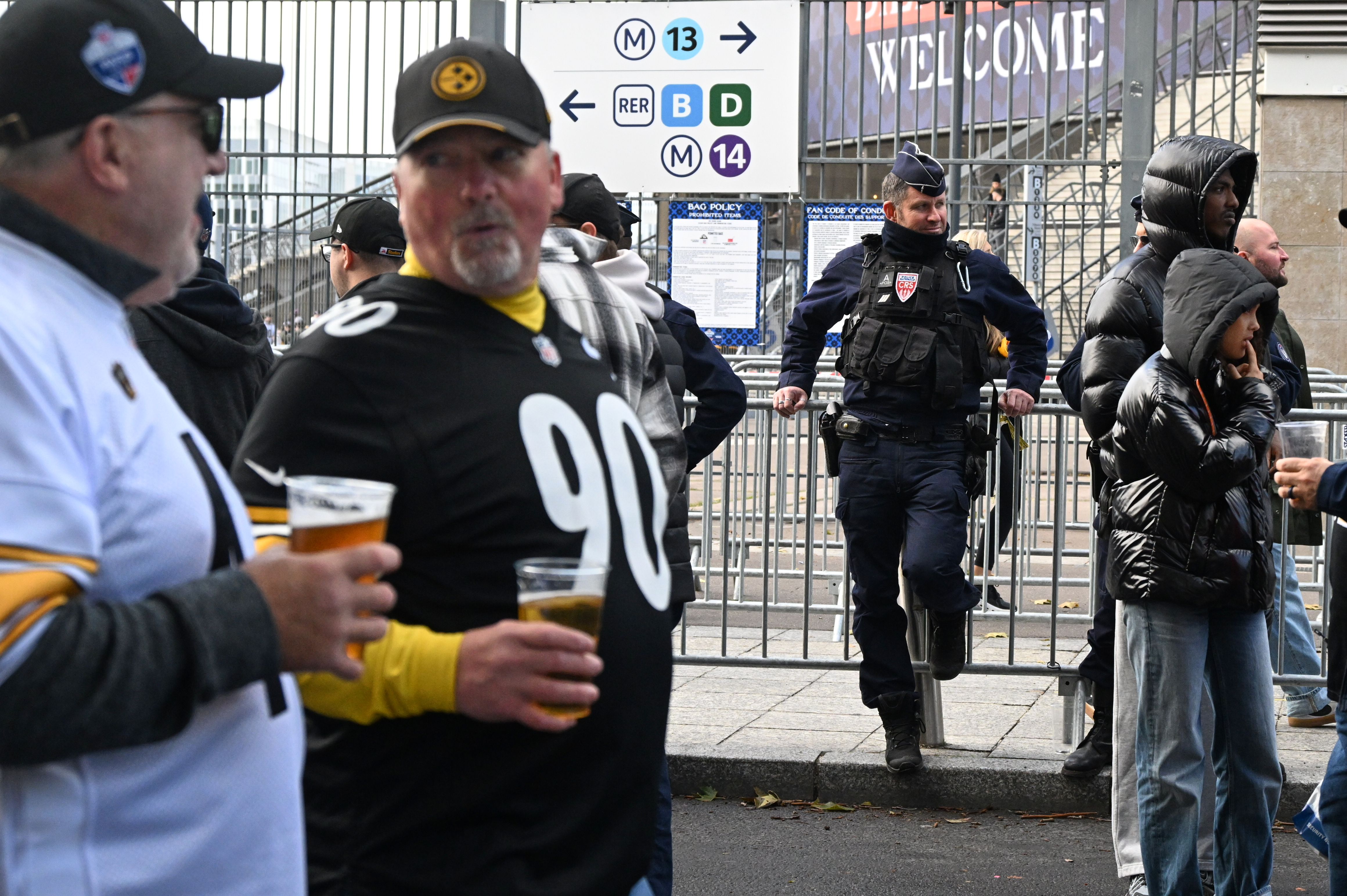 Good mood among fans attending the first NFL game in Paris, a day after protests and clashes