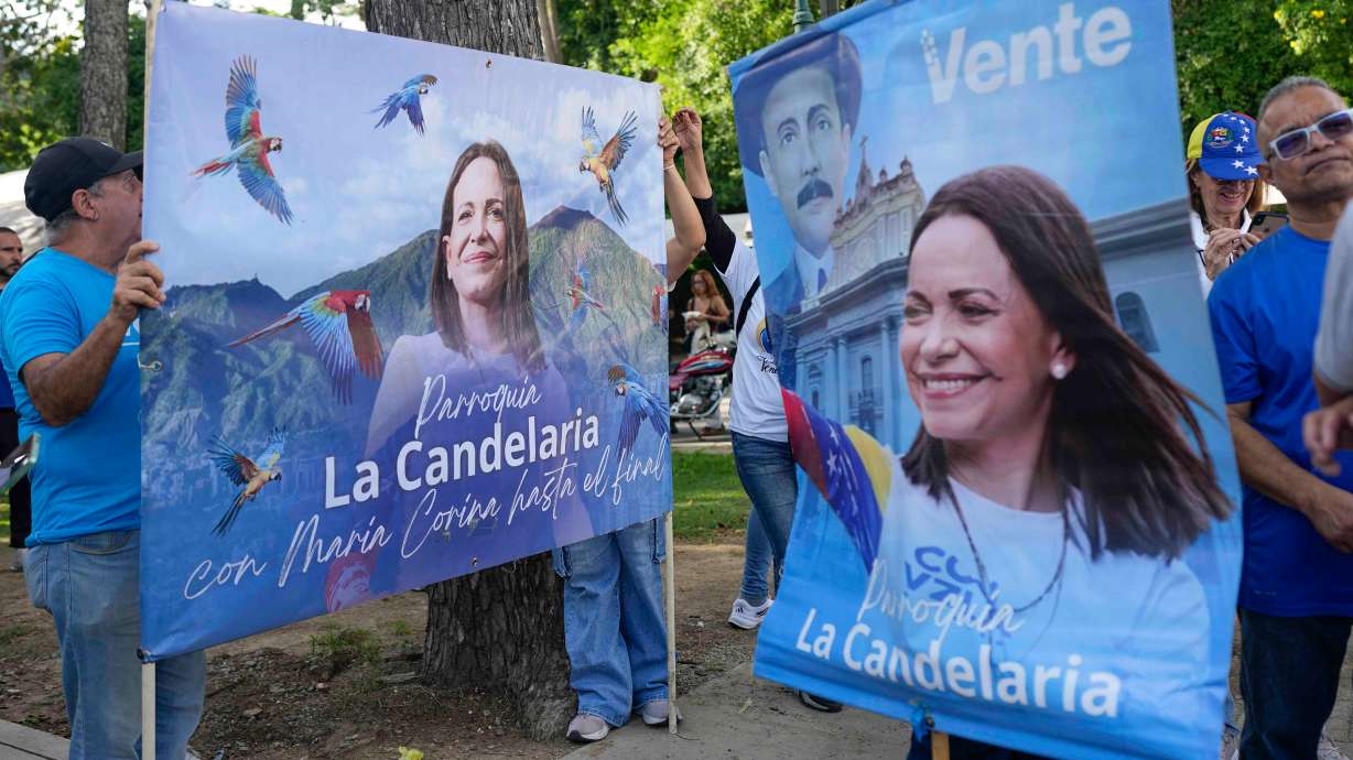Supporters of opposition leader Maria Corina Machado gather to demand that a date be set for presidential elections in Caracas, Venezuela, Thursday.