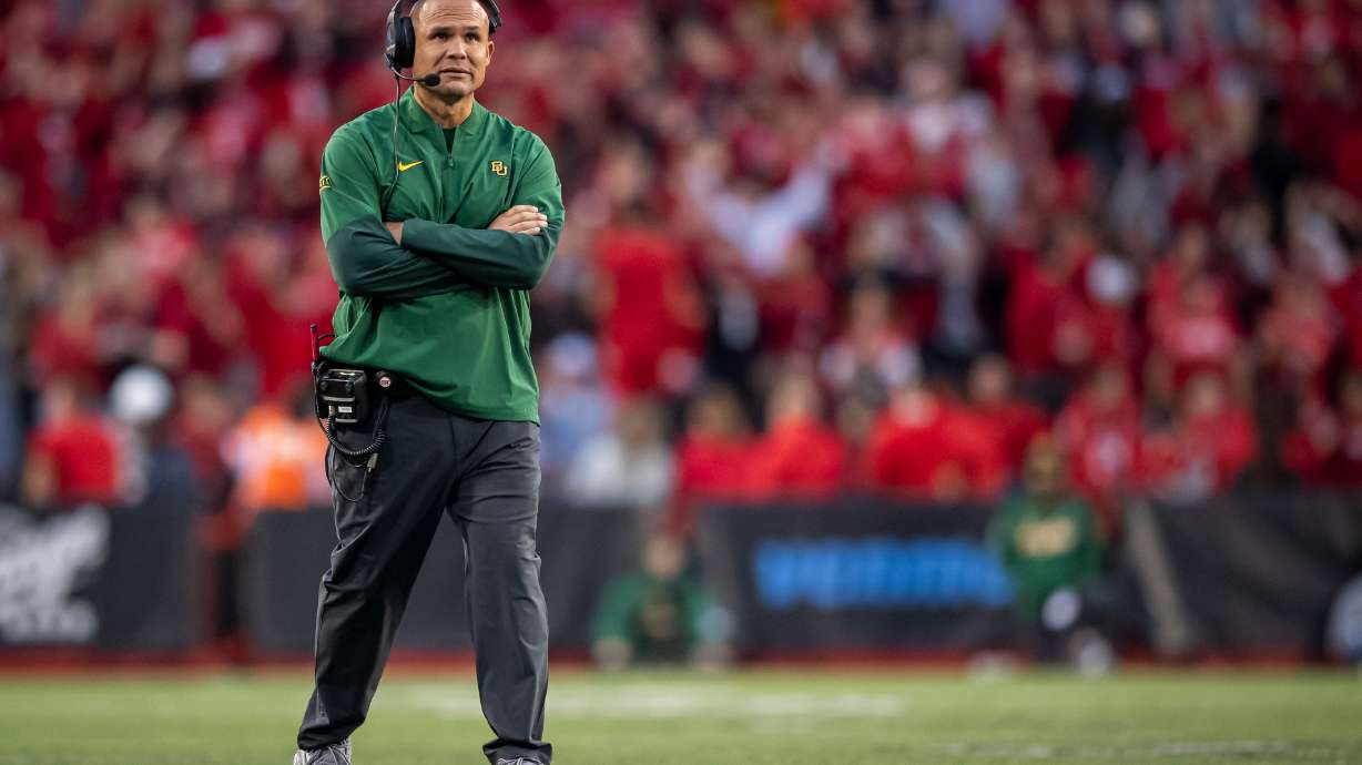 FILE - Baylor head coach Dave Aranda walks on the field during a timeout during the third quarter of an NCAA college football game against Cincinnati, Oct. 25, 2025, in Cincinnati.