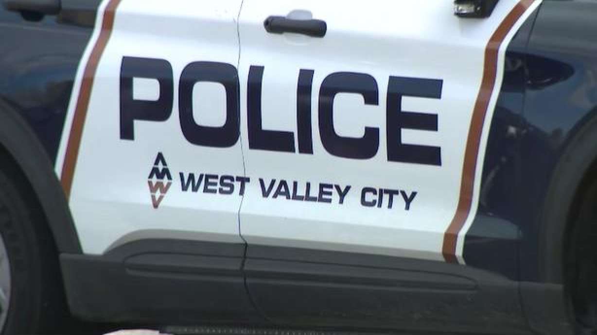 A man on Tuesday after he died on Sunday when he was shot by a police officer outside of a hotel in West Valley City.
