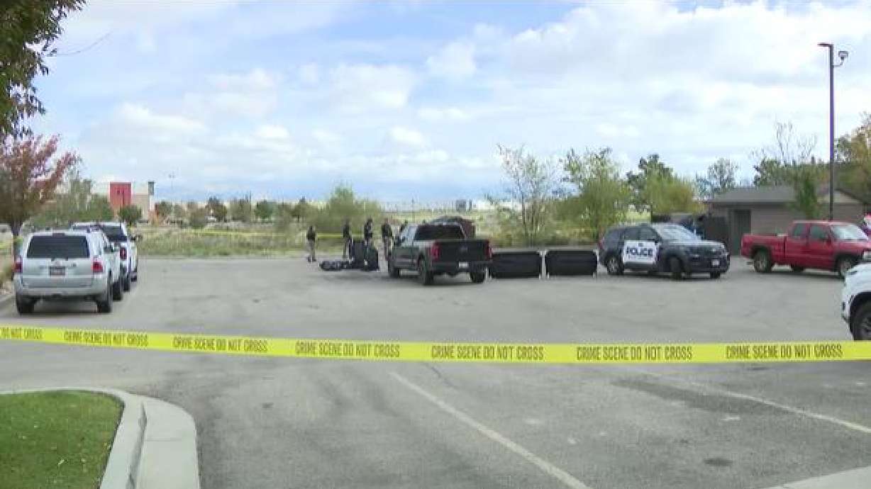 A man died after being shot by a police officer outside of a hotel in West Valley City on Sunday, police say.