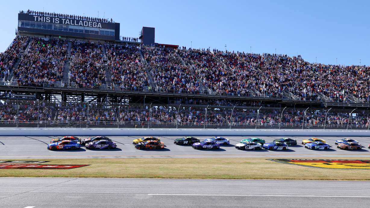 Chase Briscoe (19) leads the pack to the start of a NASCAR Cup Series auto race, Sunday, Oct. 25, 2026, in Talladega, Ala.