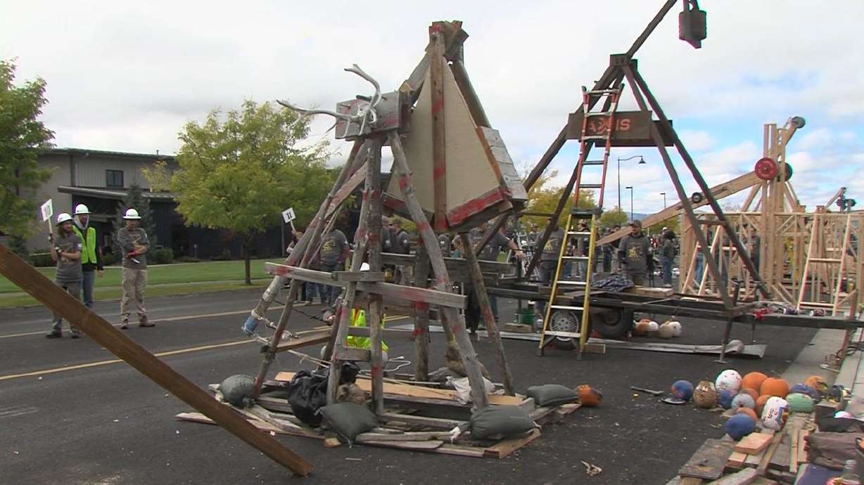 Trebuchets lined up during Utah State University's annual pumpkin toss competition on Saturday.
