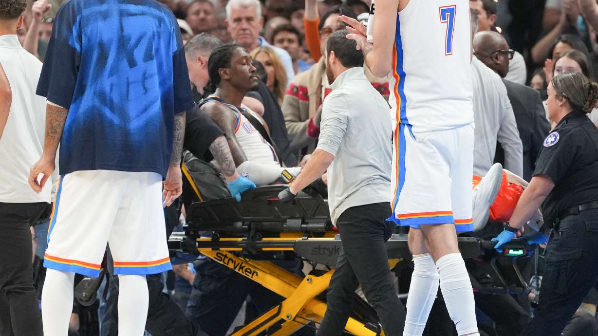Oklahoma City Thunder guard Jalen Williams is taken off the court by medical staff during the second half of an NBA basketball game against the Los Angeles Clippers, Sunday, Oct. 25, 2026, in Oklahoma City.