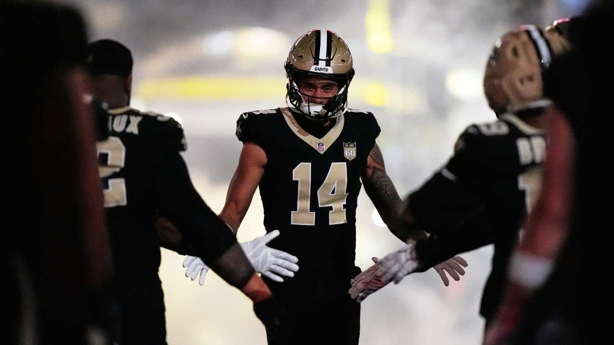 New Orleans Saints wide receiver Devaughn Vele (14) runs onto the field during player introductions before of an NFL football game against the Minnesota Vikings in New Orleans, Sunday, Oct. 11, 2026.
