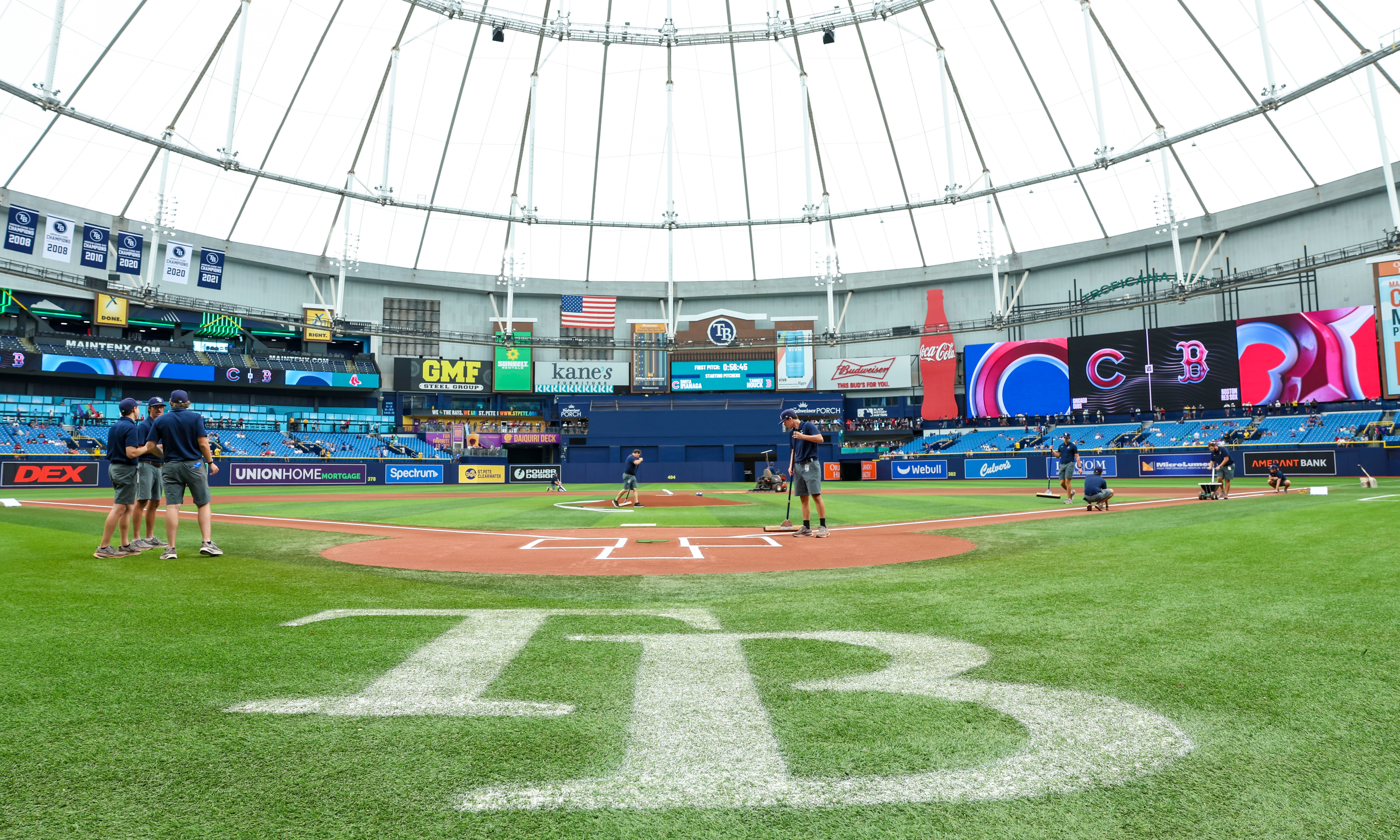 Crews prepare the field for a baseball game between the Chicago Cubs and the Boston Red Sox at Tropicana Field, Sunday, Sept. 27, 2026, in St. Petersburg, Fla. 