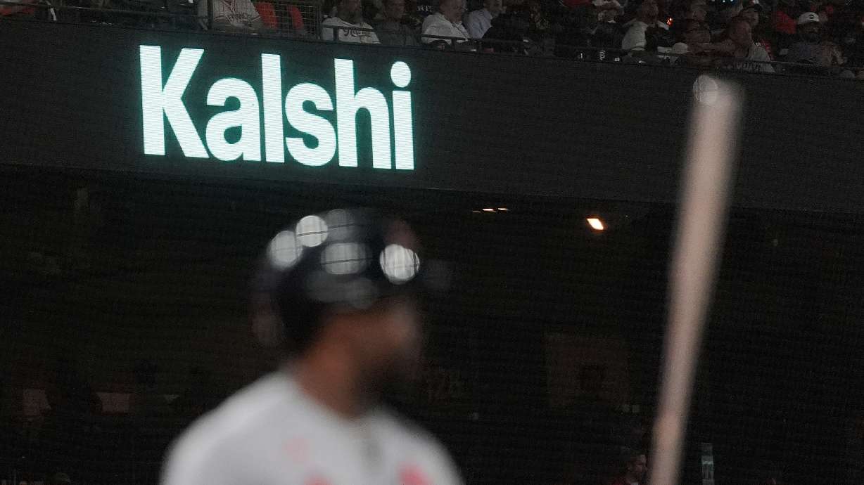 FILE - A Kalshi advertisement is displayed at Oracle Park during a baseball game between the San Francisco Giants and the St. Louis Cardinals, Tuesday, Sept. 8, 2026, in San Francisco.