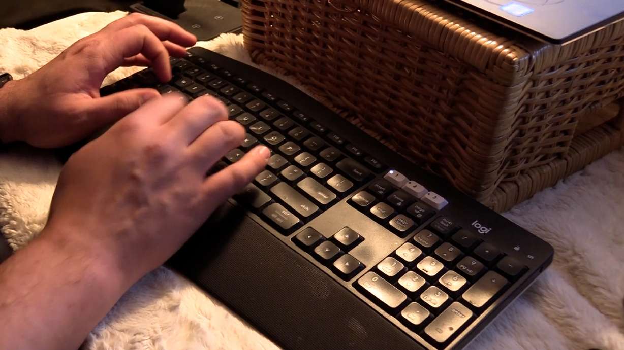 A person types on a computer keyboard. When online sellers take your money but never deliver, tracking them down can be nearly impossible.