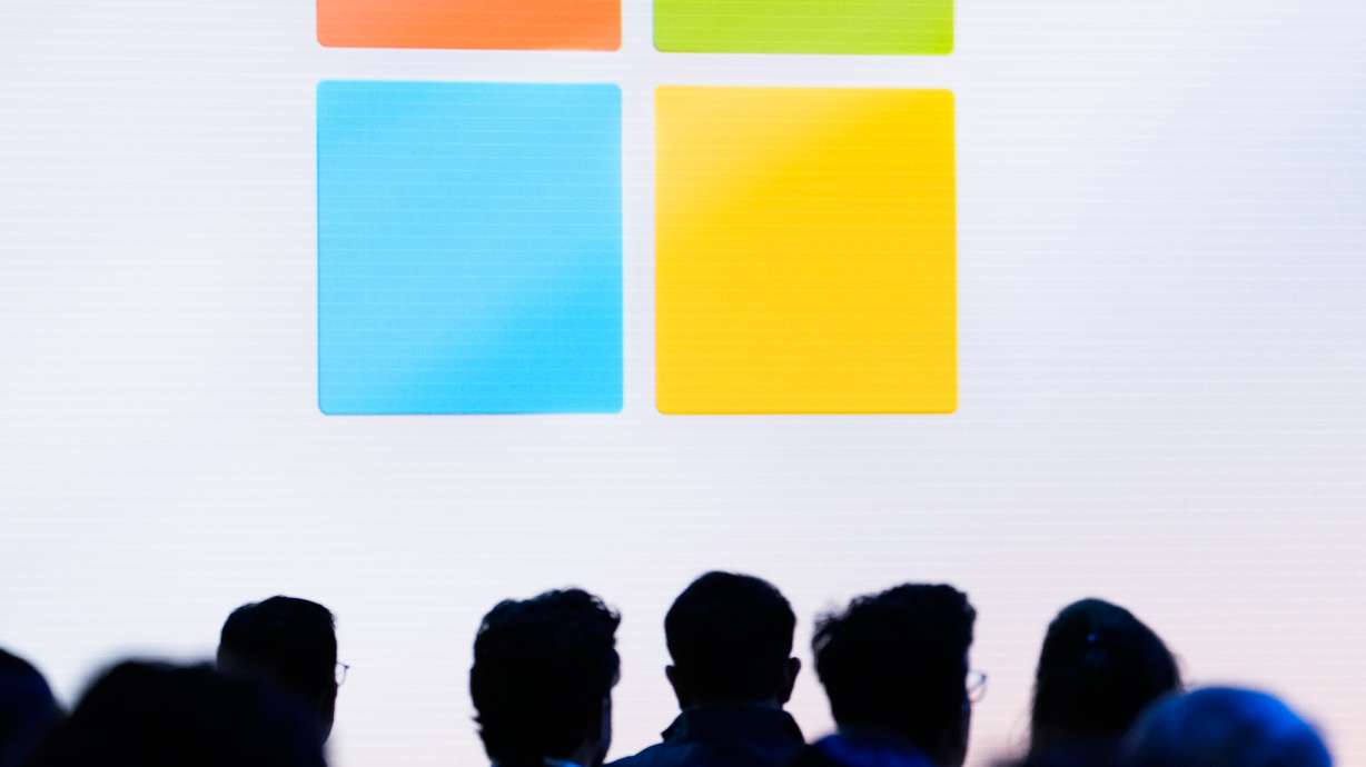 People attend a showcase event of the company's AI assistant, Copilot, ahead of the annual Build developer conference at Microsoft headquarters, May 20, 2024, in Redmond, Wash.