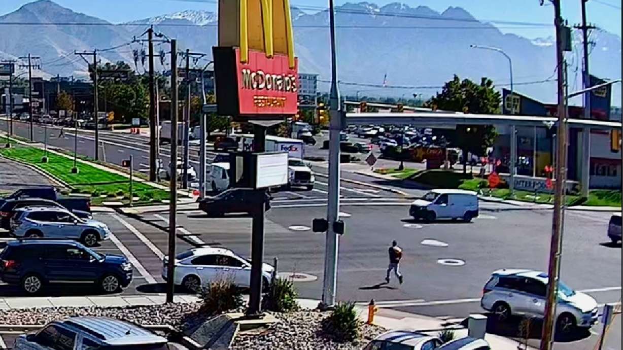 A man and woman who helped a suspected immigrant in the country illegally escape authorities in Salt Lake City each face four days of jail following sentencing on Monday. The photo shows the suspected immigrant fleeing officials.