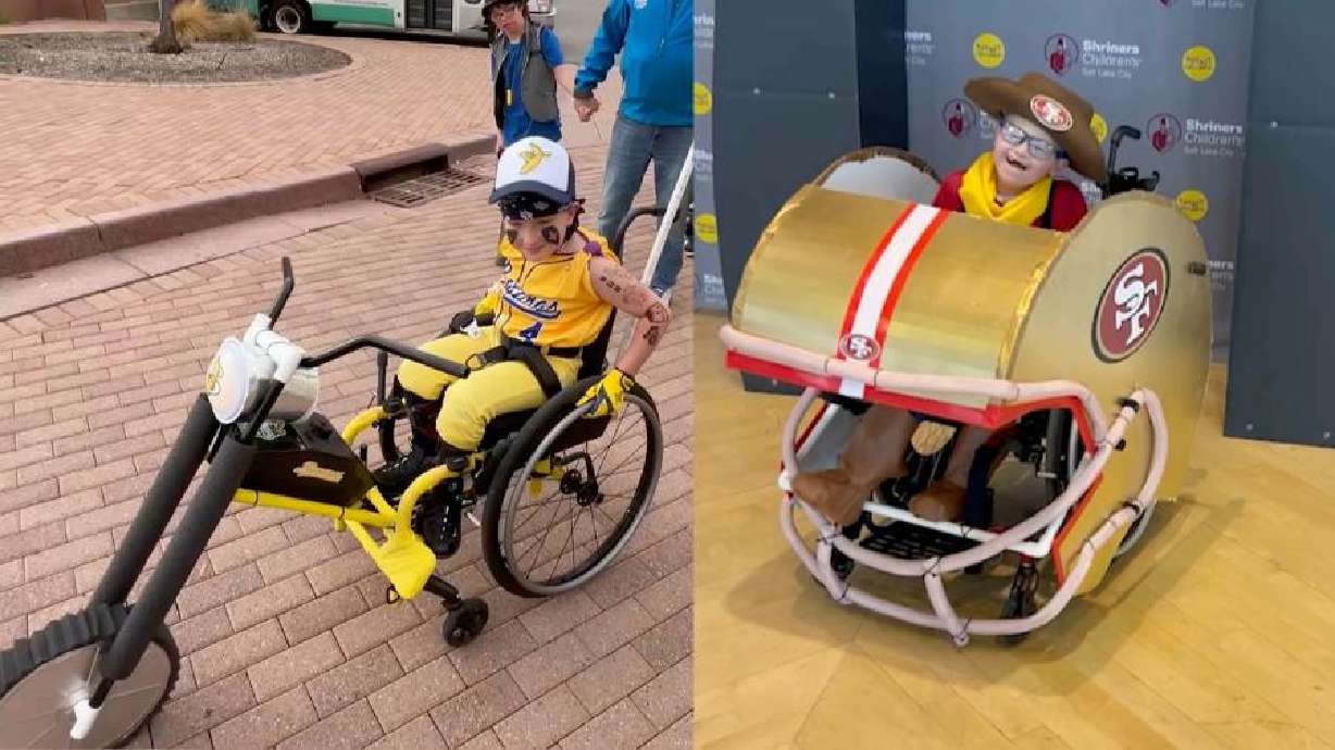 Two children show off their wheelchair costumes at Shriners Children's Hospital in Salt Lake City.