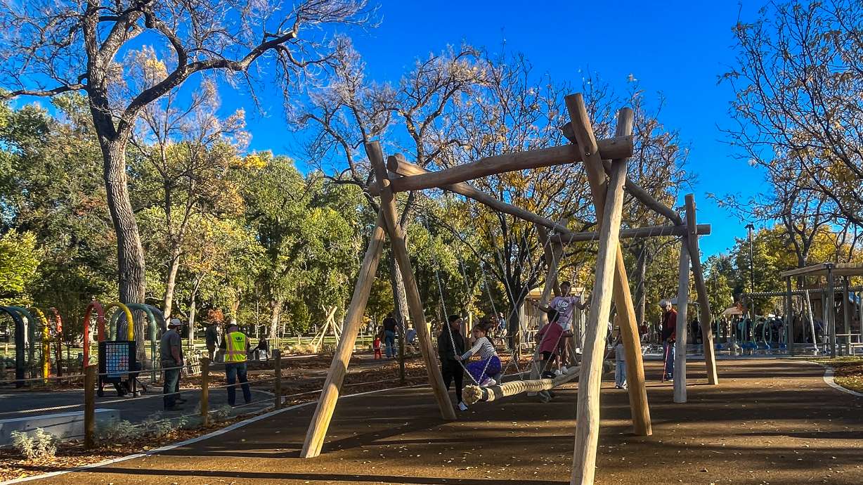 Children play on Liberty Park’s new inclusive Rotary Play Park on Monday. The new playground was built over the past year, adding more options for children of all abilities, including children with hearing, vision and sensory impairments.