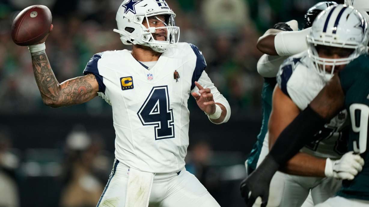 Dallas Cowboys quarterback Dak Prescott looks to pass during the first half of an NFL football game against the Philadelphia Eagles in Philadelphia, Monday, Oct. 26, 2026.
