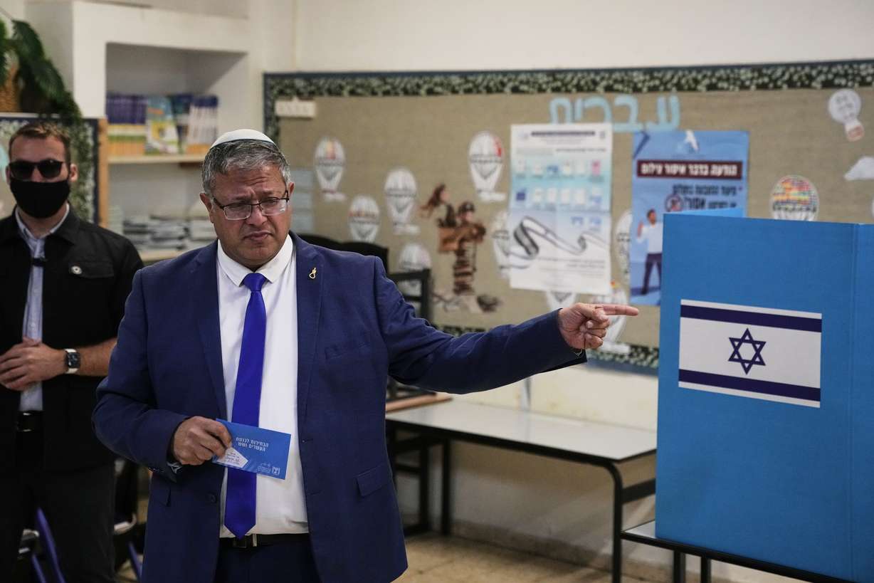 National Security Minister Itamar Ben-Gvir, head of the Otzma Yehudit party, casts his vote during Israel's general elections in the West Bank settlement of Kiryat Arba, Tuesday. Ben-Gvir said it will be "Mansour Abbas' government" if Netanyahu and his allies don't win the election.