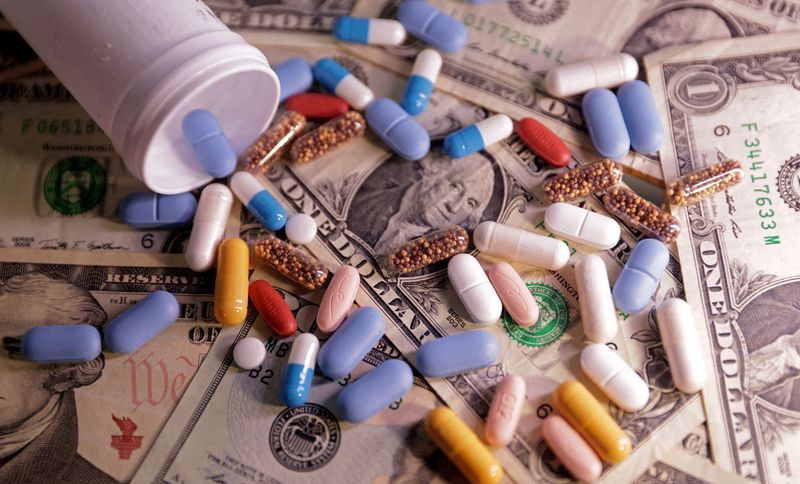 U.S. dollar banknotes and medicines are seen in this illustration taken, June 27, 2024.