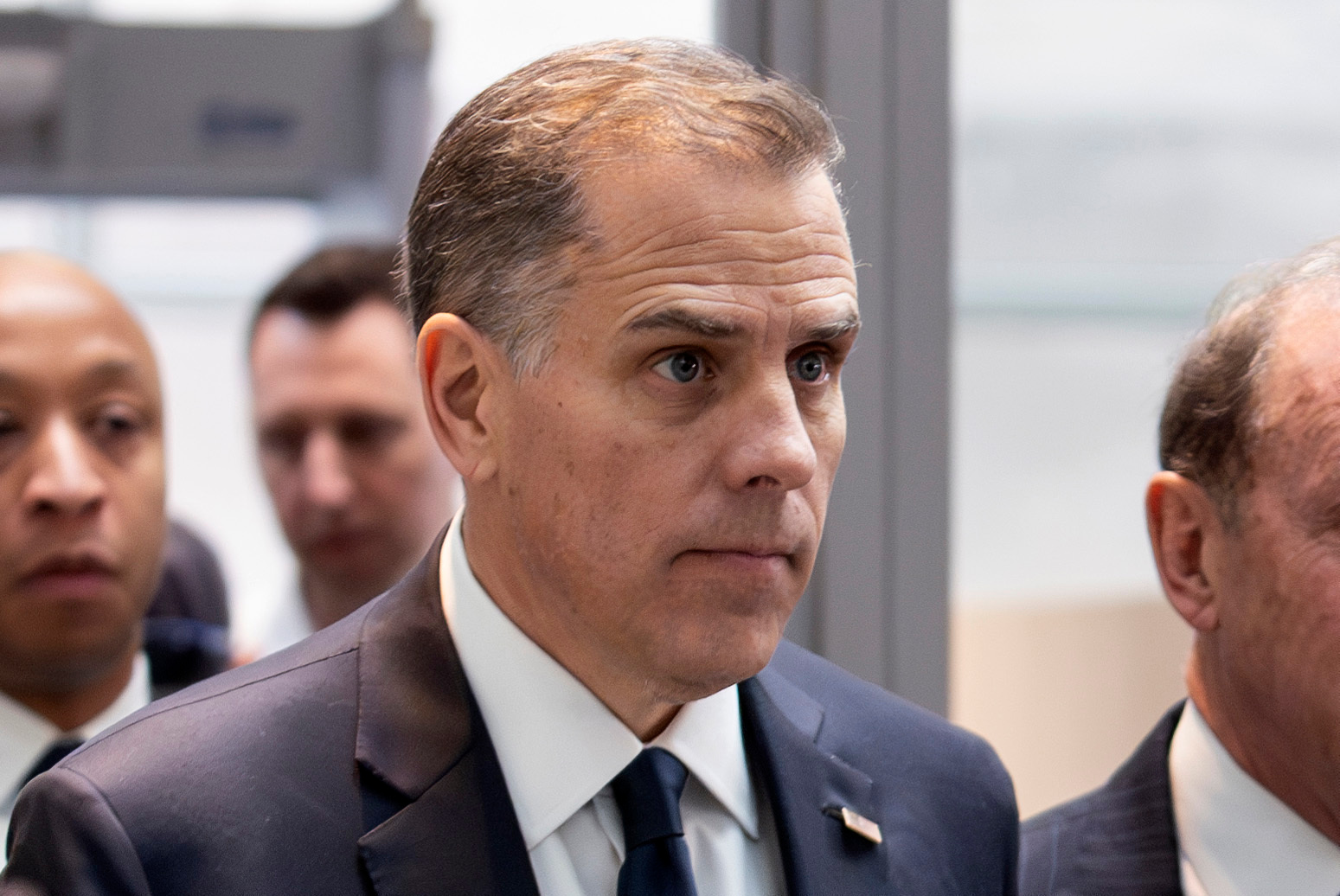 Hunter Biden arrives for a closed-door deposition on Capitol Hill in Washington, Feb. 28, 2024. Two FBI officials involved in investigations into Biden are due in court on Tuesday, charged with lying to Congress.