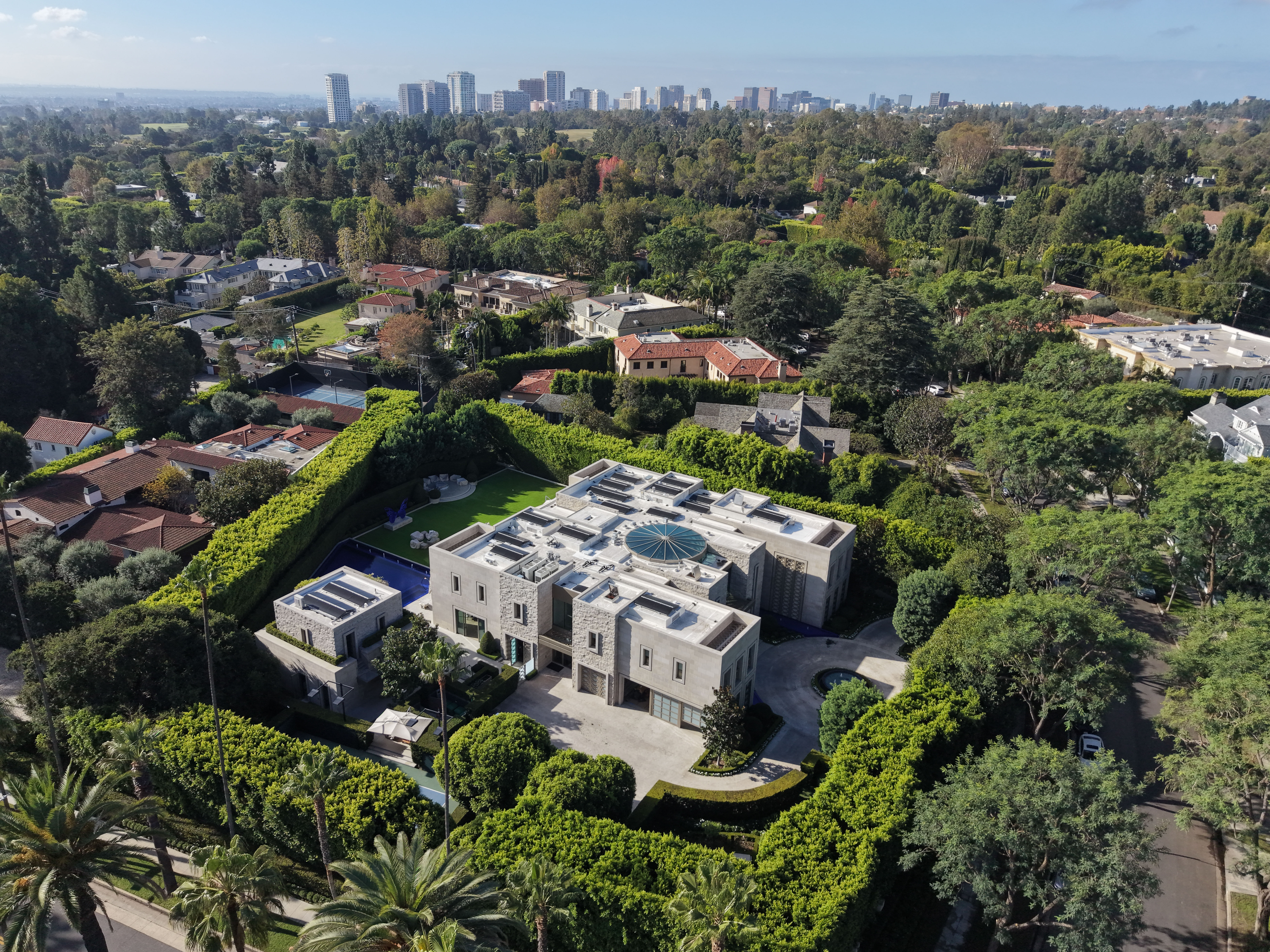 AP sources: Federal agents search Beverly Hills mansion in investigation of ex-Rep. Eric Swalwell
