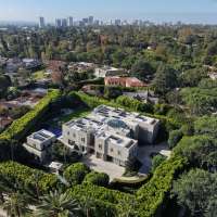 AP sources: Federal agents search Beverly Hills mansion in investigation of ex-Rep. Eric Swalwell