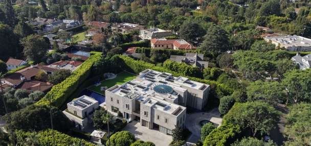 AP sources: Federal agents search Beverly Hills mansion in investigation of ex-Rep. Eric Swalwell
