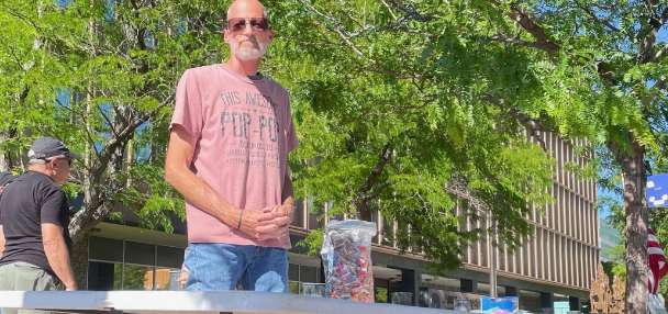 'First Amendment right': Man plans to fight charge for placing sign identifying license-plate reader