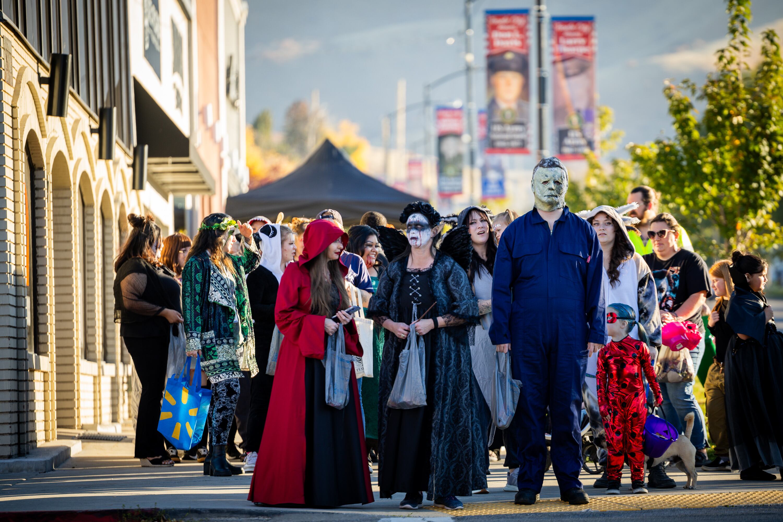People trick-or-treat during the Tooele City Downtown Halloween Trick-or-Treat Main Street in Tooele on Oct. 31, 2025. Americans will spend over $13.5 billion on Halloween this year, experts said.