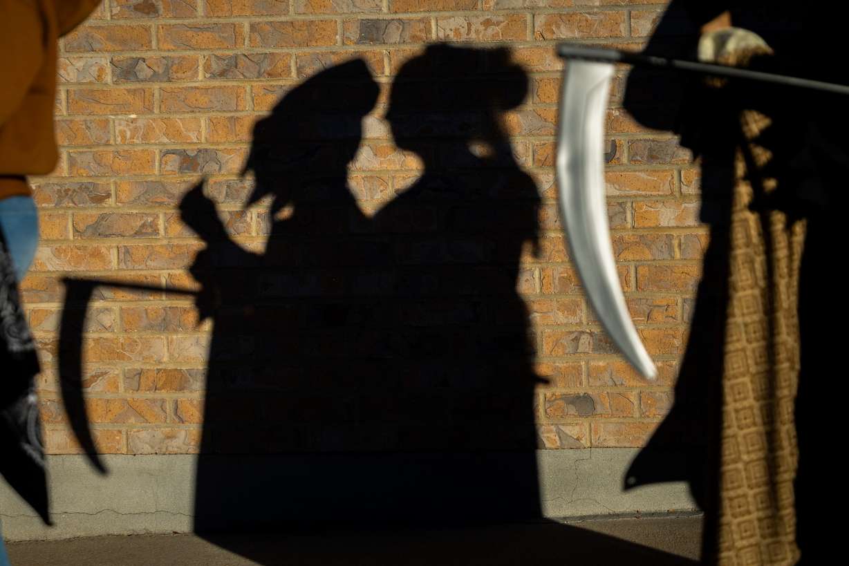 People trick-or-treat during the Tooele City Downtown Halloween Trick-or-Treat Main Street in Tooele on Oct. 31, 2025. Halloween has become the biggest "single-use" holiday of the year, experts said.