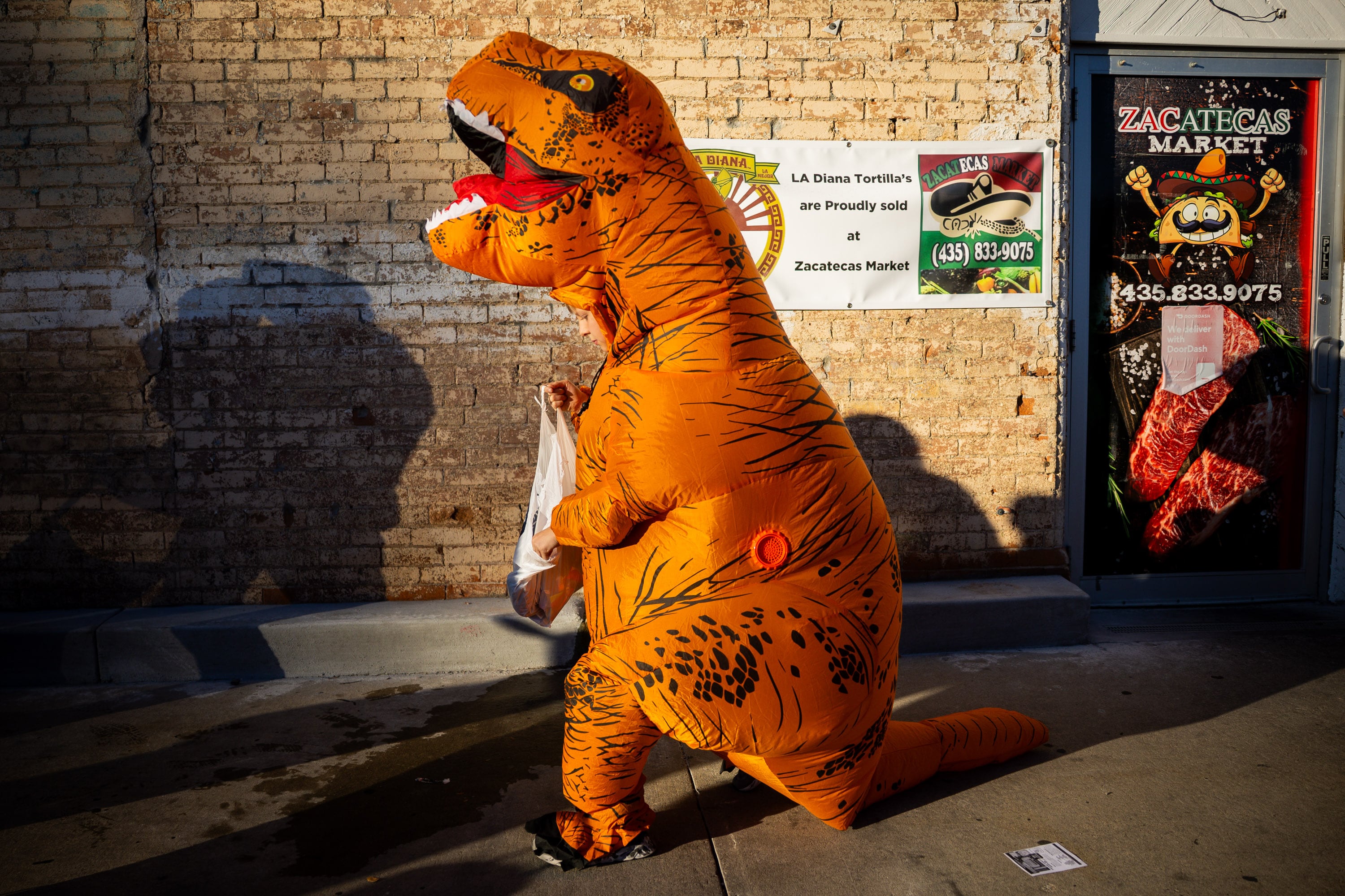 People trick-or-treat during the Tooele City Downtown Halloween Trick-or-Treat Main Street in Tooele on Oct. 31, 2025. There are ways to reduce waste this Halloween.
