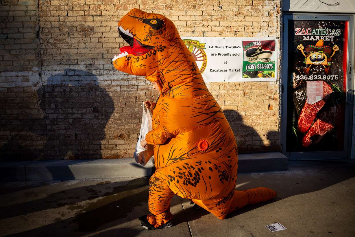 People trick-or-treat during the Tooele City Downtown Halloween Trick-or-Treat Main Street in Tooele on Oct. 31, 2025. There are ways to reduce waste this Halloween.