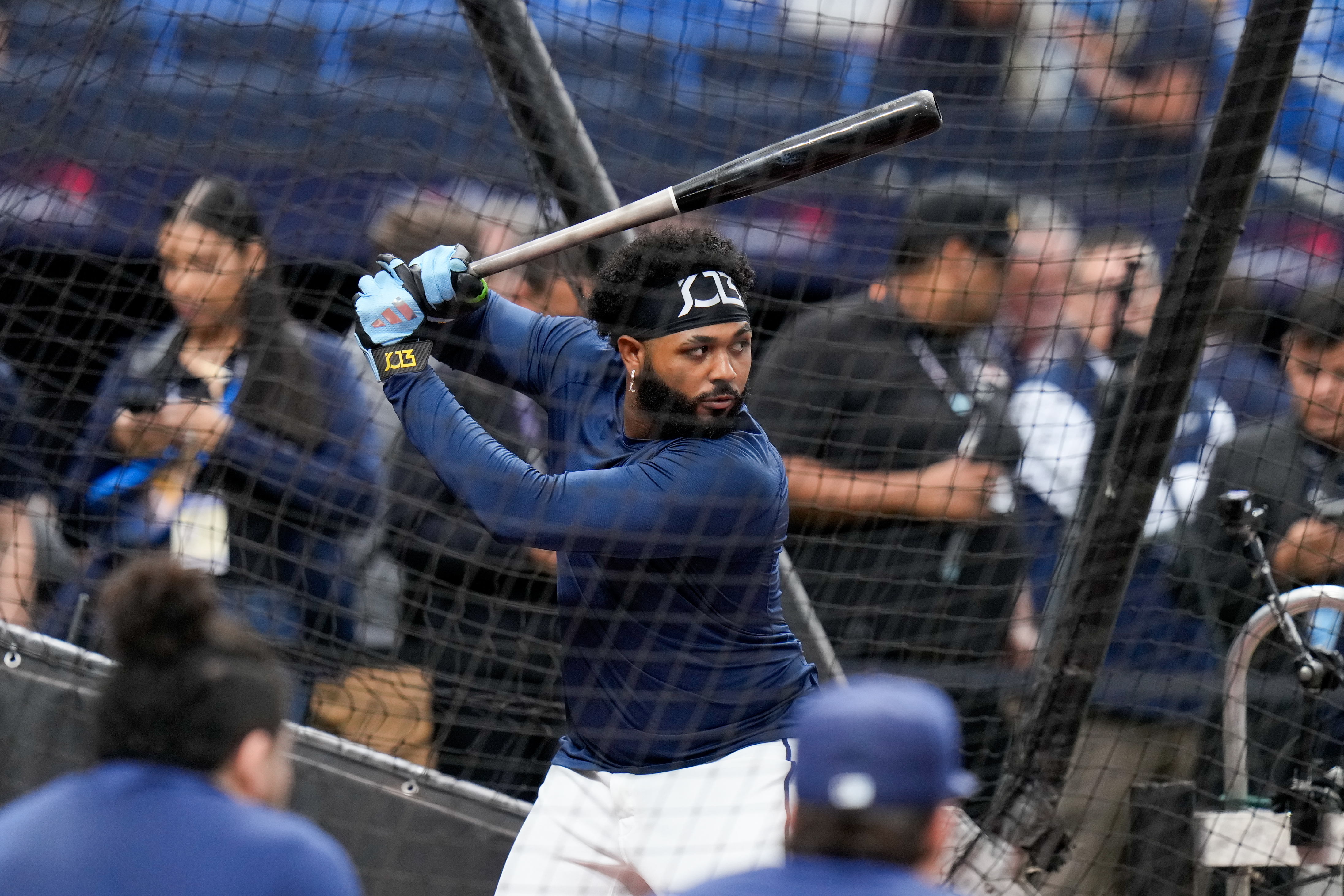 Tampa Bay Rays third baseman Junior Caminero takes batting practice prior to Game 4 of baseball's World Series, Tuesday, Oct. 27, 2026, in St. Petersburg, Fla., between the Milwaukee Brewers and the Tampa Bay Rays. 